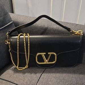 Black Shoulder Bag with Gold Accents